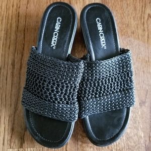 Black slip on sandals